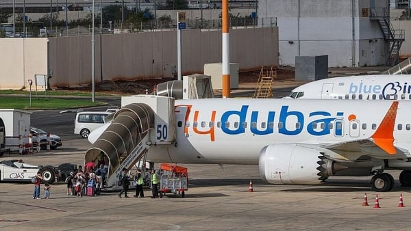 Passengers board a flydubai flight, bound for Dubai, before taking off from Ben Gurion Airport near Tel Aviv on September 30, 2026. A passenger on a rerouted flydubai flight that was bound for Tel Aviv said one of the pilots tried to crash the plane and k