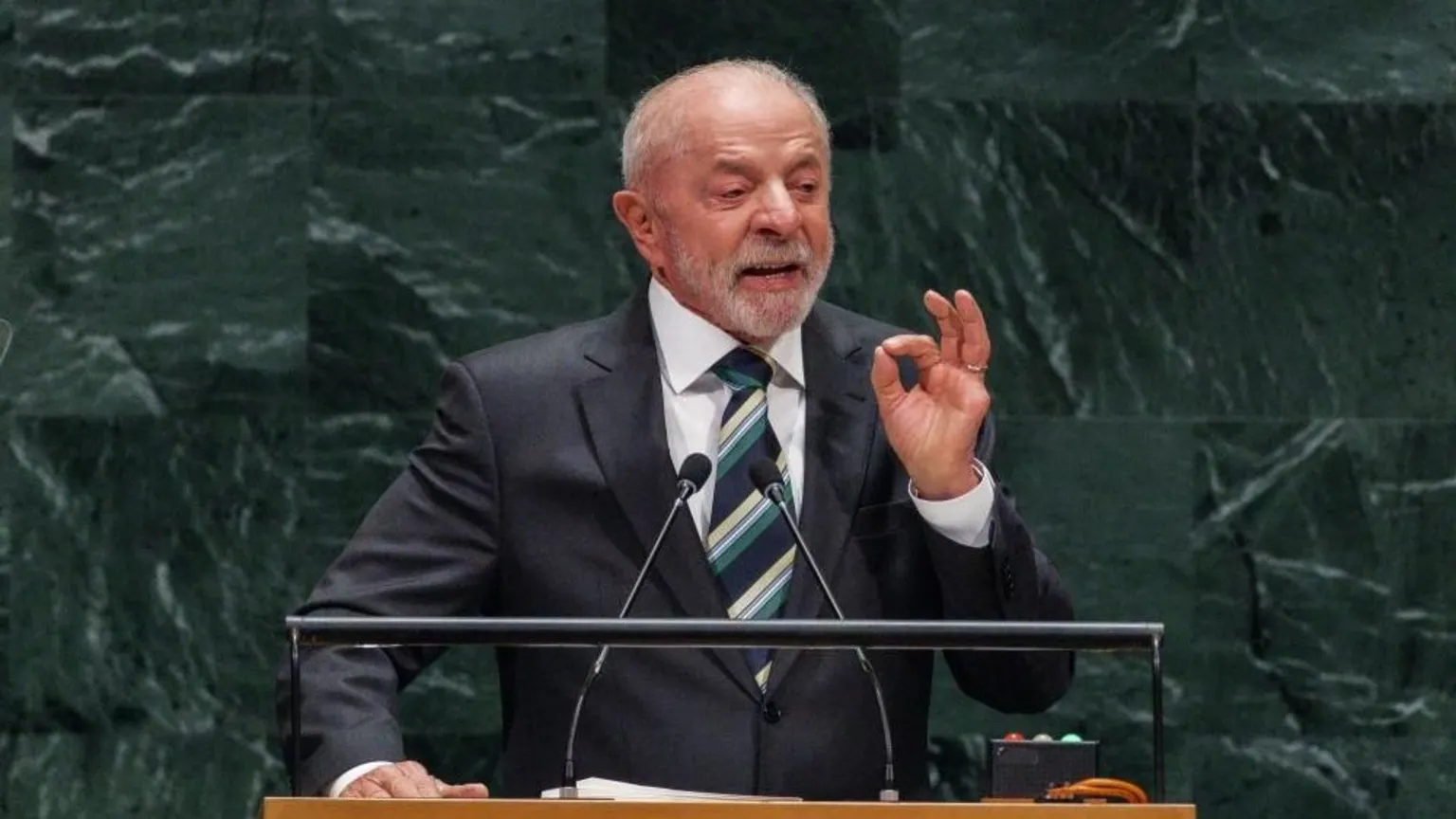 Olga Fedorova/EPA/Shutterstock Brazilian President Luíz Inácio Lula da Silva speaks during the General Debate of the 81st session of the United Nations General Assembly in New York on 22 September 2026. He is wearing a dark suit, a striped tie and a white shirt and is gesturing while he is speaking.