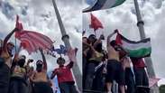 Manifestantes queimam bandeira dos EUA durante ato a favor de Lula em São Paulo