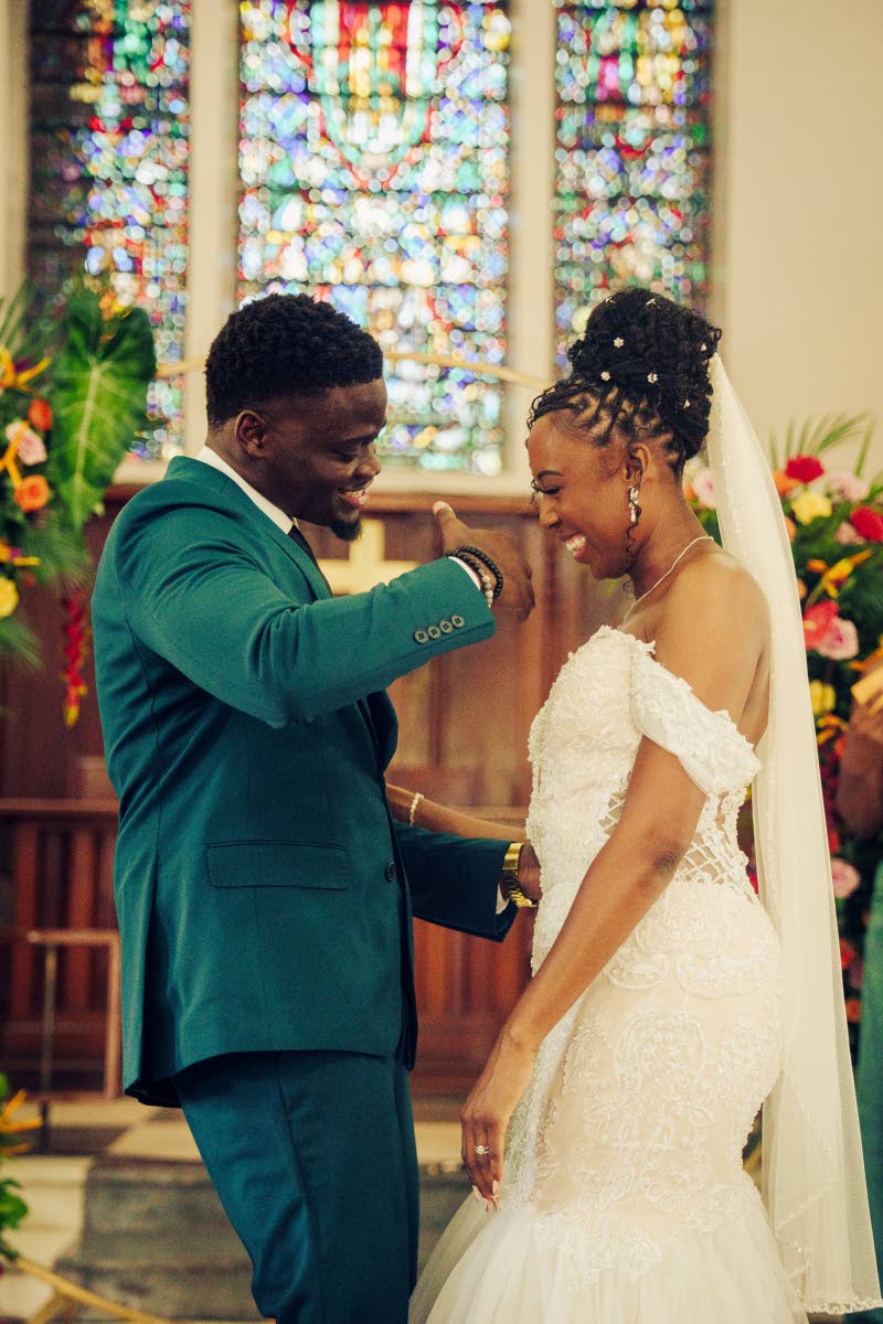 Damoy and Deneal dance their way out of the UWI Chapel to Mortimer’s ‘Lightning’.