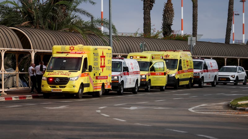 Ambulances are kept at the ready as passengers arrive in Israel on the second flydubai aircraft. Reuters